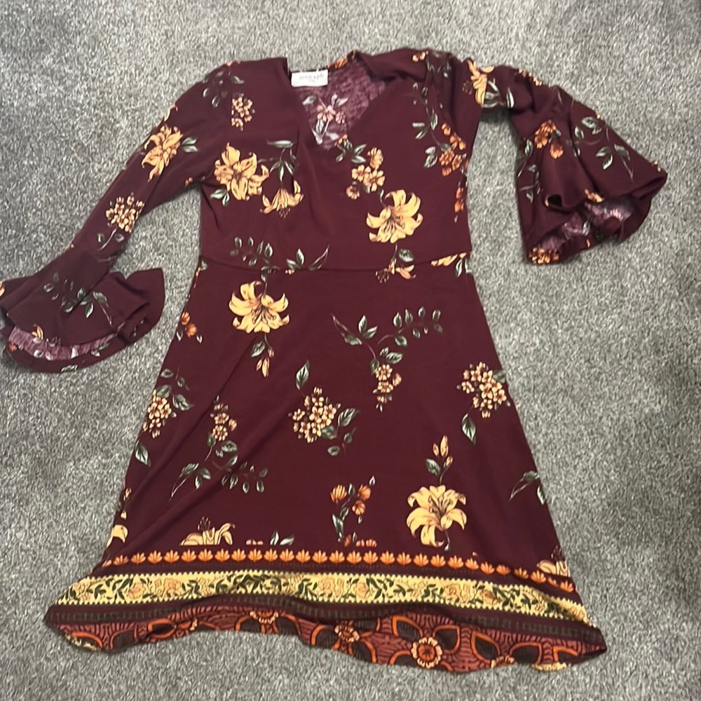 Angie girls plum colored dress with orange and green flowers in a Size XL.